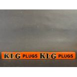 A K.L.G. Plugs embossed tin shelf strip, in good condition.