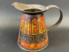A Shell Motor Oil quart measure with wide pouring neck, bearing the words 'As good as Shell