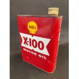 A Shell X-100 Motor Oil rectangular can with original cap.