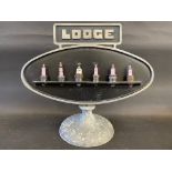 A Lodge spark plugs advertising display stand, 16 x 18".