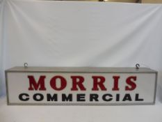 A Morris Commercial illuminated lightbox, 60" wide x 14" high x 8 1/2" deep.