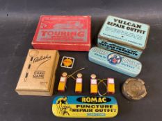 A Vulcan Repair Outfit tin in good condition, two further repair outfit tins, two motoring related
