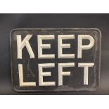 A KEEP LEFT sign with raised lettering, 13 1/2 x 9 3/4".