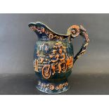 A large ceramic jug depicting a lady and a gentleman riding a tandem bicycle, made by Shorter & Sons