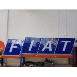 A large FIAT four piece garage showroom illuminated sign by Bloom Signs, each letter formed as an