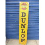 A Dunlop Stock aluminium advertising sign, 11 1/4 x 59 1/4".