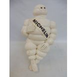 A Michelin Mr Bibendum figure on bracket, 1966 Made in France.