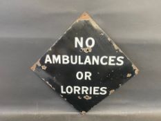 A rare and unusual black and white lozenge shaped enamel sign bearing the words 'No Ambulances or