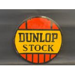 A Dunlop Stock circular double sided enamel sign, in good condition, 24" diameter.