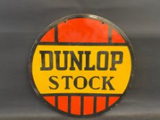 A Dunlop Stock circular double sided enamel sign, in good condition, 24" diameter.