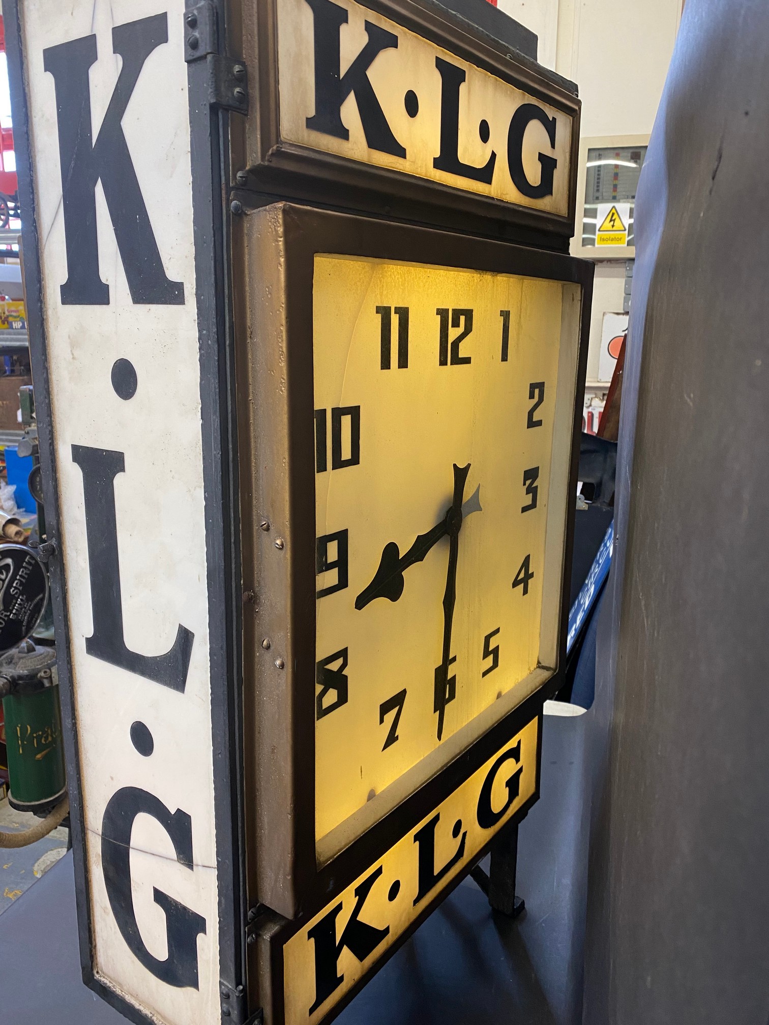 A rare and highly original K.L.G. garage advertising double sided clock with original dials and milk - Image 7 of 10