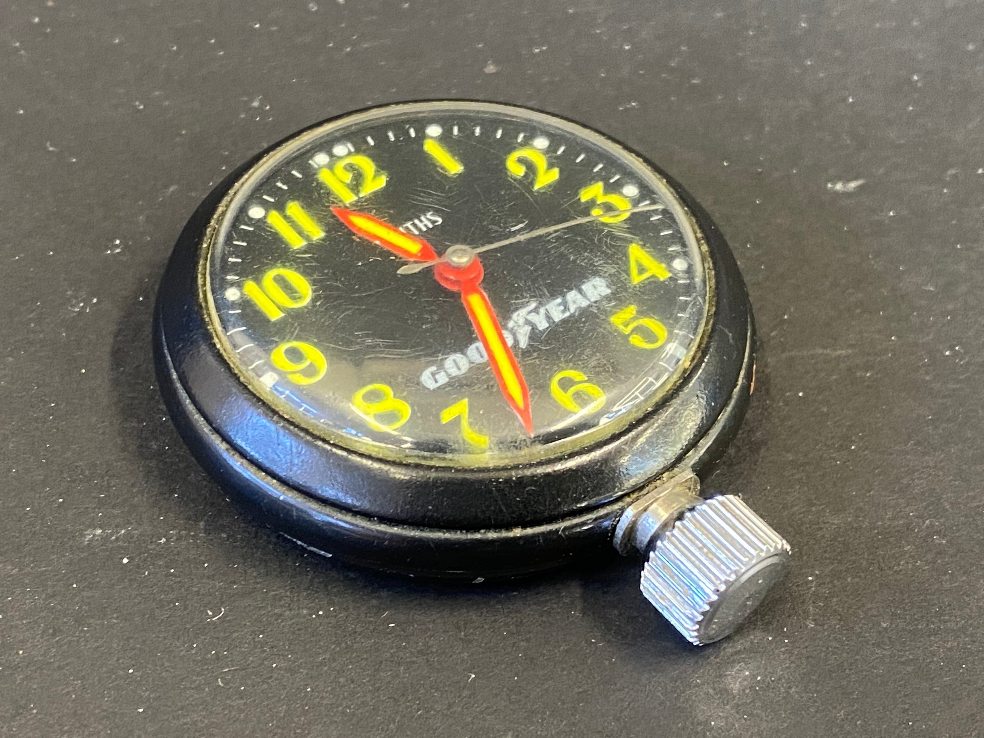 A Smiths stop watch/pocket watch advertising Goodyear.