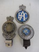 Three early RAC car badges.
