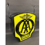 A decorative dome-topped hanging lightbox bearing AA garage emblem to both sides, 23 1/2" wide x 24"
