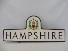 A 'Hampshire' cast aluminium county boundary marker, with crest pediment, unusually with repair