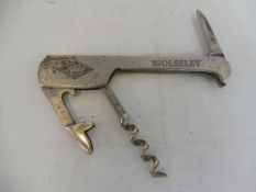 An MG, Morris, Riley and Wolseley penknife with corkscrew and bottle opener.