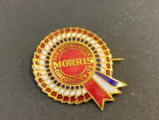 A B.M.C. Morris enamel lapel badge.