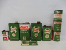 A collection of Castrol oil cans, three quart versions, plus three Castrol grease tins.