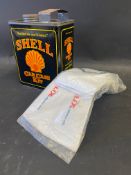 A Shell Car Care Kit tin and partial contents.