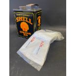 A Shell Car Care Kit tin and partial contents.