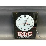 A K.L.G. Plugs Too Good To 'Miss' glass fronted Smiths Sectric advertising wall clock, 10 1/2 x