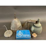 Two copper funnels, an RAC First Aid tin etc.