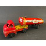 A tinplate articulated model of an Esso Motor Oil/Petrol tanker.