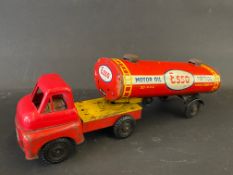 A tinplate articulated model of an Esso Motor Oil/Petrol tanker.
