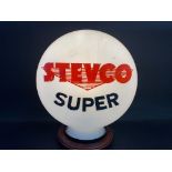 A very rare Stevco Super glass petrol pump globe, with minor chips to neck.