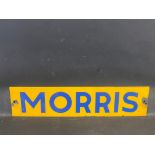 A rectangular enamel sign bearing the brand Morris, believed to be a crane company, 22 x 5".