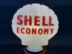 A Shell Economy glass petrol pump globe by Hailware, fully stamped underneath, one small chip to
