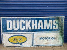 A large Duckhams 20-50 Motor Oil tin sign, 78 1/2 x 39 1/2".