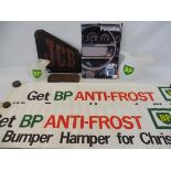 Two BP plastic water jugs, two BP Anti-Frost paper banners, a JCB metal advertising sign and various