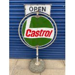 A Castrol garage forecourt open/closed spinning sign on stand.