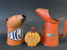 A Vigzol pint measure, a Wesco measure plus a Shell Handy Oil bottle.