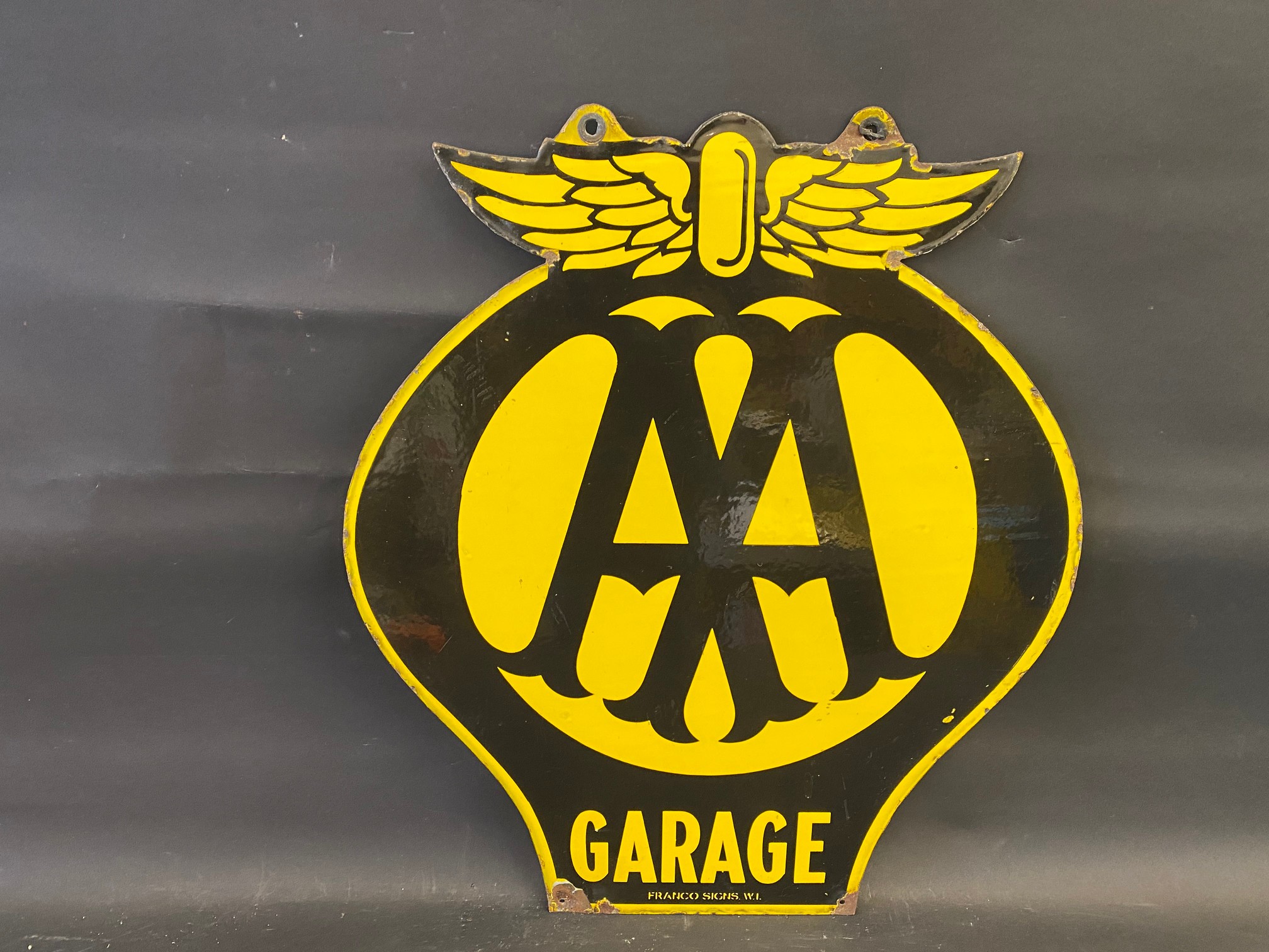 An AA Garage double sided enamel sign by Franco, 22 x 25".
