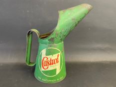 A Wakefield Castrol Motor Oil quart measure.