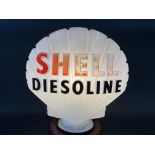 A Shell Diesoline glass petrol pump globe by Hailware, faint stamps underneath, minor nibbles to