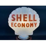 A Shell Economy glass petrol pump globe by Hailware, fully stamped underneath and dated August 1972.