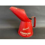 A Havoline Motor Oil half gallon measure.