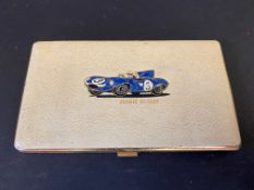A rare Ecurie Ecosse branded leather and gilded metal cigarette case with design to the front