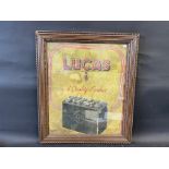 A framed and glazed Lucas car battery pictorial showcard, 20 1/2 x 23 1/2".