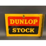 A Dunlop Stock double sided enamel sign with hanging flange, in excellent condition, 18 x 12".