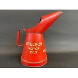 A Thelson Tractor Oils half gallon measure, in good condition.