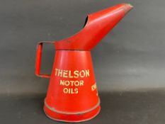 A Thelson Tractor Oils half gallon measure, in good condition.