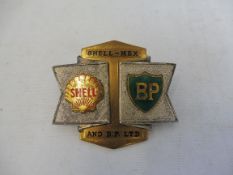 A Shell-Mex and BP Ltd cap badge.