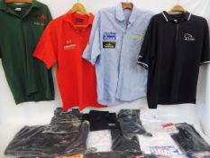 A collection of motorsport related clothing.