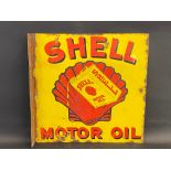 A rarely seen Shell Motor Oil double sided enamel sign with central image of a can pouring oil, re-