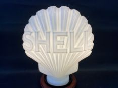 A reproduction Continental Shell glass petrol pump globe, in good condition.