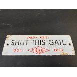 A small Vigzol Oils 'Shut This Gate' enamel sign, 7 1/2 x 2 1/2".